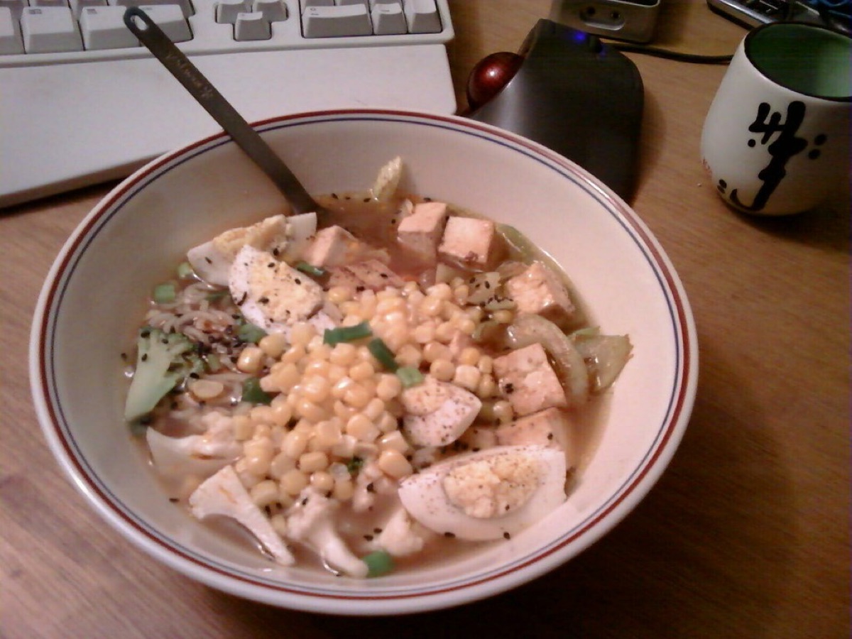 Ramen noodle bowl with broth and toppings