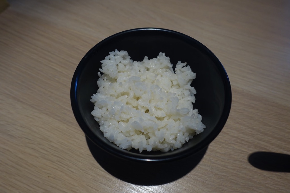 Ramen noodles and broth in a ceramic bowl
